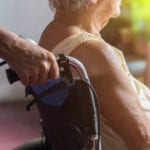 Old woman in a wheelchair