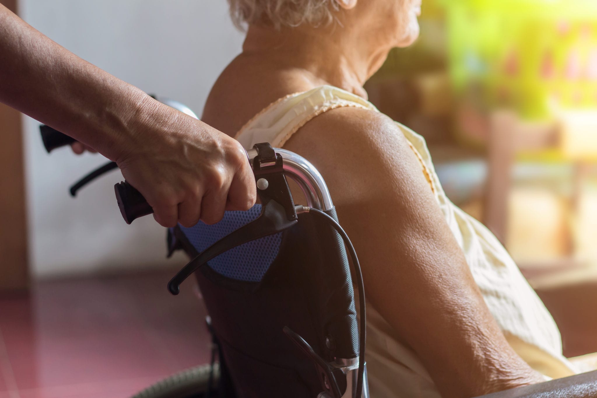 Old woman in a wheelchair