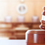 a gavel sits in a courtroom