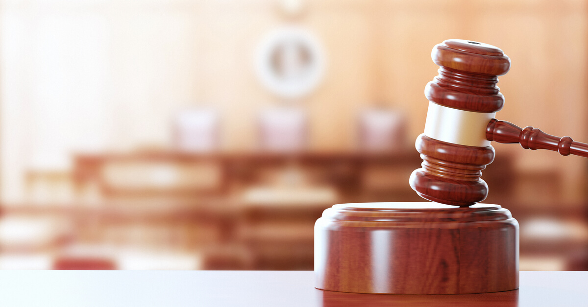 a gavel sits in a courtroom