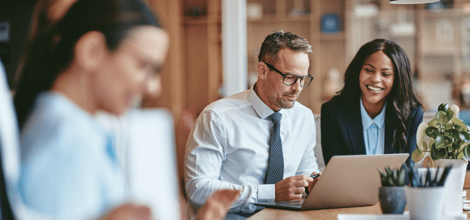 legal team looking at laptop