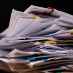 A stack of papers illustrating nursing home complaints