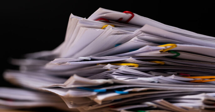 A stack of papers illustrating nursing home complaints